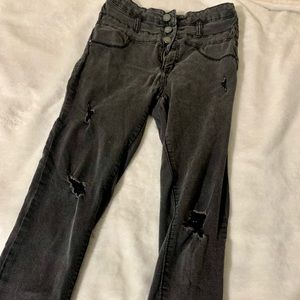 Distressed black ripped jeans